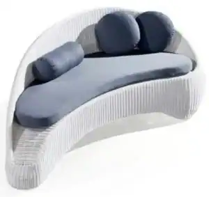 Modern hotel lobby sofa with upholstered cushions and curved design.